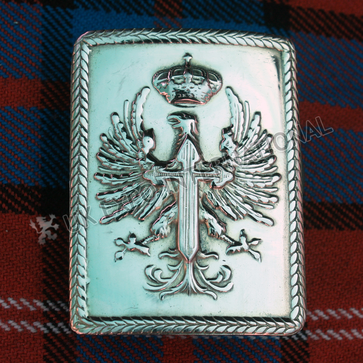 Eagle brass badge with cross in centre