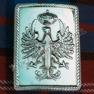 Eagle brass badge with cross in centre